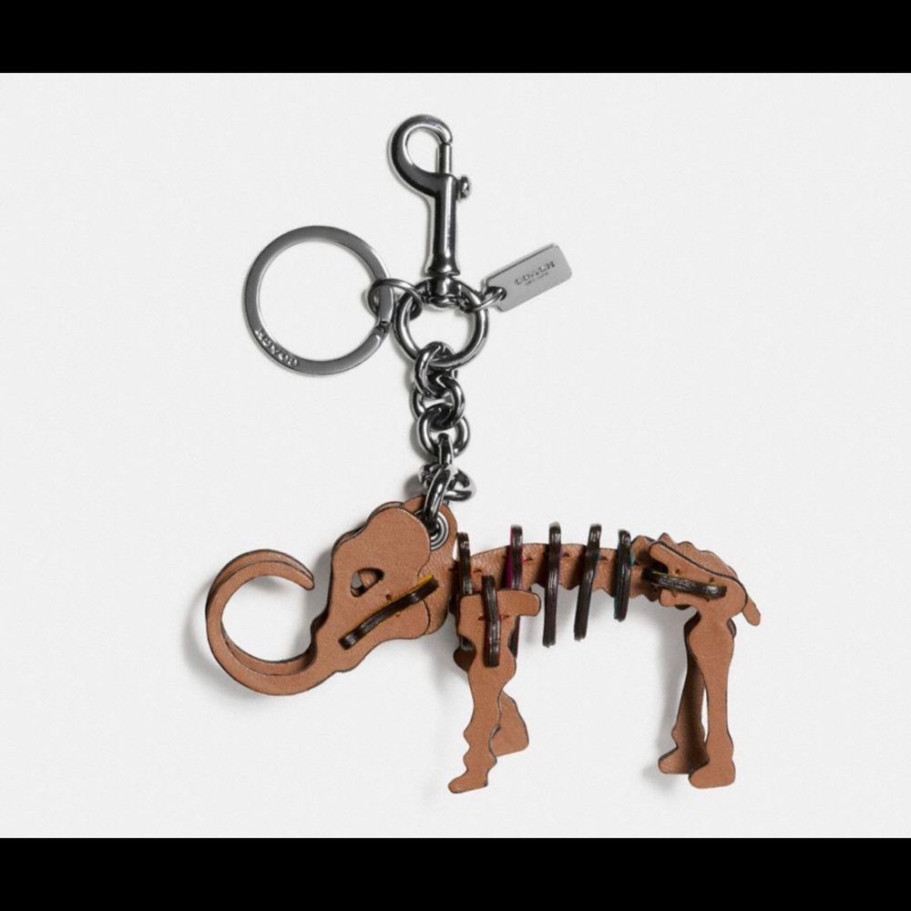 ISO Small Coach Woolly Woolly Mammoth Dinosaur Rexy Puzzle Bag Charm Keychain